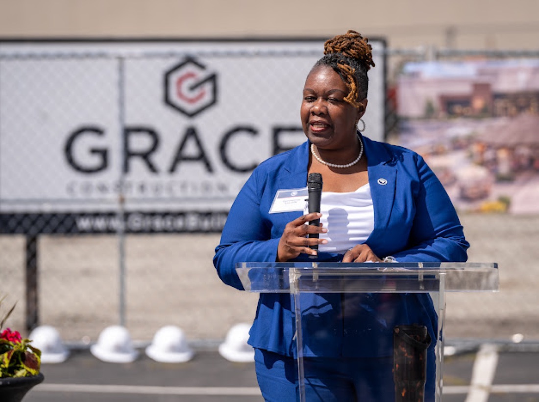 Tyra Little delivering remarks at a community groundbreaking